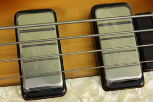 diamond logo pickups on the Hofner reissue of th famous 1961 Beatles cavern bass.